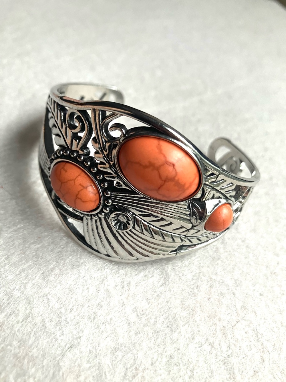 Silver southwest cuff bracelet with orange stones